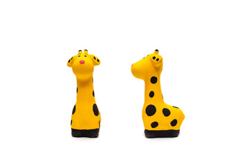 Ceramic giraffe on white background