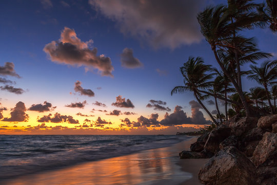 Sunrise on the beach of caribbean sea © ValentinValkov