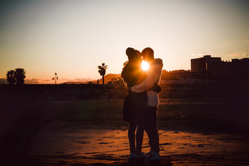 Couple is kissing at the sunset on the beach - 81775038