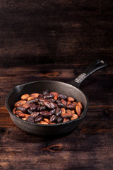 roasted cocoa chocolate beans  in a pan