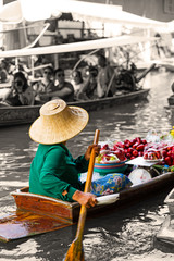 Traditional floating market in Damnoen Saduak near Bangkok.