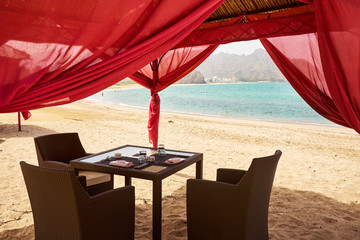 Dinner table by the beach