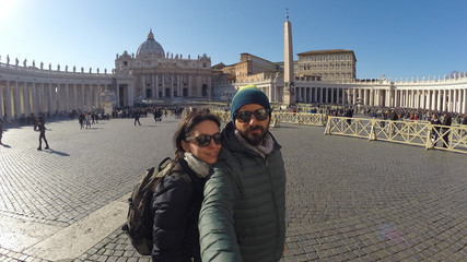 ROME, ITALY - MARCH 7, 2015: Tourists couple by Vatican city and