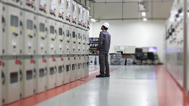 Engineer working in electrical substation