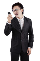 Furious worker screaming on his cellphone