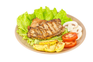 Grilled meat with vegetables and mushrooms isolated on white