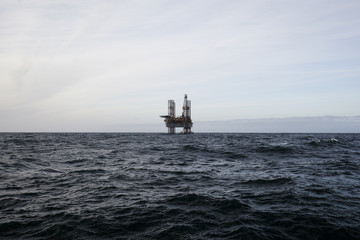 Oil platform on the North Sea while cloudy day
