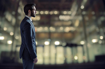 Elegant man in the luxury office block