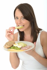 Healthy Happy Young Woman Holding a Plate of Norwegian Breakfast