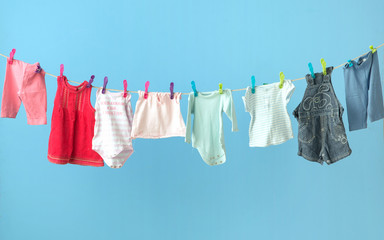 Colorful baby's clothes getting dry