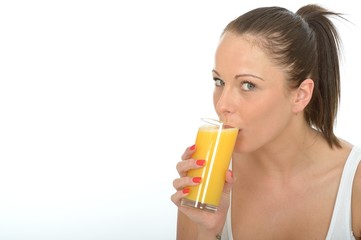 AttractiveYoung Woman Holding a Glass Of Fresh Orange Juice