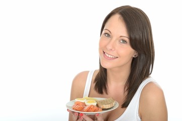 Happy Young Woman Holding a Plate of Norwegian Style Breakfast