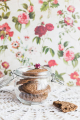Rustic home made cookies on the wooden background with milk