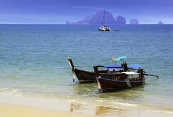 Ao Nang beach with boat in Krabi
