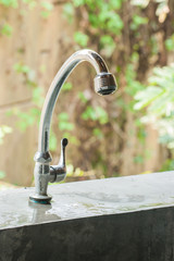 Metal faucet.
