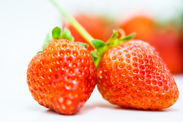 Strawberry berries on a white background.