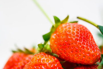 Strawberry berries on a white background.