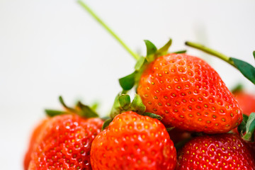 Strawberry berries on a white background.