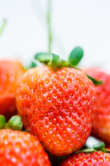 Strawberry berries on a white background.