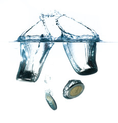 money in water with bubbles on white background