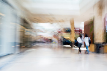 People silhouettes at the shopping mall