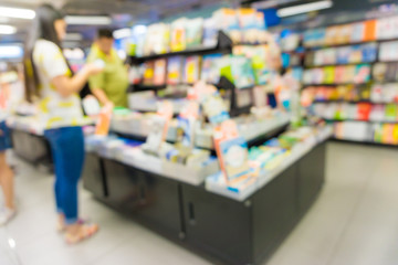 Abstract blurred people walking in book store