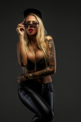 Beautiful blond female in studio