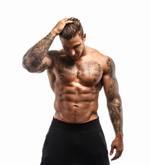 Attractive muscular male on white background