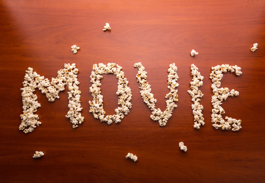 Word "movie" written with popcorn