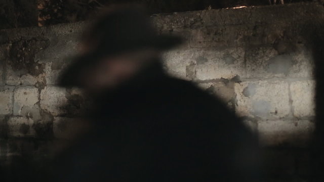 Young frightened woman running away from the pursuer