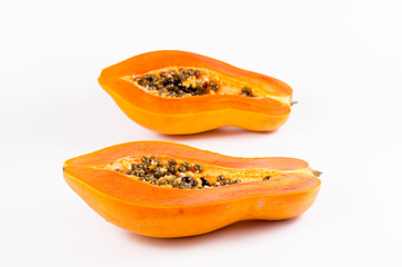 Two haft of fresh papaya isolated on white background