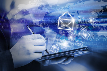 Business woman are sending email marketing by using digital tabl