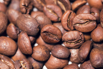 Brown coffee beans, close-up of coffee beans for background 
