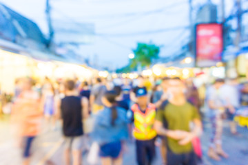 Blur of tourists are walking and shopping in Chatuchak market