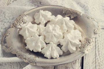 White meringue on plate served in elegant style.