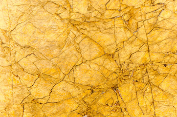 Gelbe rissige Marmor Wand