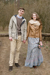 Loving couple in the forest in spring