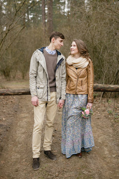 Loving couple in the forest in spring