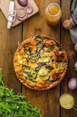 Polenta quiche with red onion and herbs