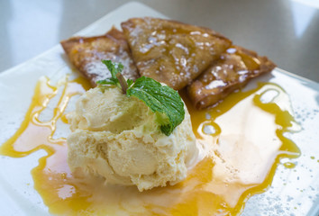 Ice cream with crepes and honey