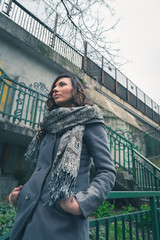Beautiful girl posing in an urban context