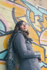 Beautiful girl posing in an urban context