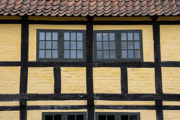 Medieval timbered yellow  brown house  in Aarhus, Denmark