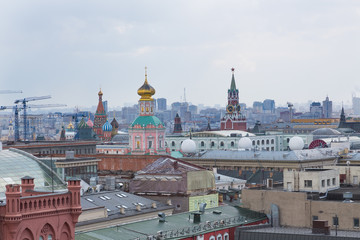 Fototapeta premium Panoramic view of the building from the roof of Moscow in cloudy