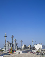 Fototapeta na wymiar Gas turbine power plant with blue sky 