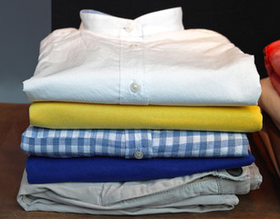 Stack of clean modern clothes