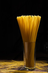 italian spaghetti on black