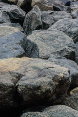 Fototapeta na wymiar Rock pile on Whitby beach