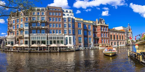 Fotobehang canals of Amsterdam.Panoramic image © Freesurf