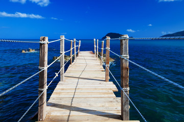 Obraz premium wooden bridge - sea, summer.